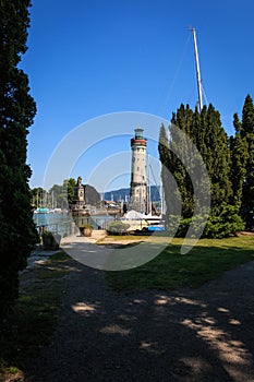 Harbor entrance in Lindau on Lake Constance with the landmark lion and lighthouse, Bavaria, Germany