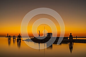 Harbor entrance at sunset