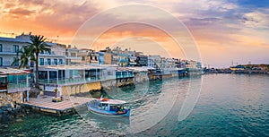 The harbor of the famous resort Chersonissos, Crete, Greece .