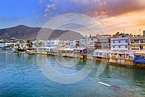 The harbor of the famous resort Chersonissos, Crete, Greece .