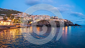 Harbor and fishing Camara de Lobos at twilight time, Madeira island, Portugal