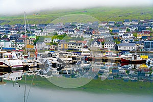 The harbor of KlaksvÃ­k, the second largest town of the Faroe Islands, located on BorÃ°oy, one of the northernmost islands of the