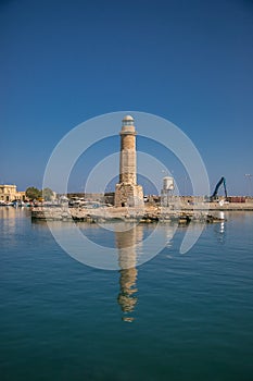Harbor and lighthouse of the city of rethymno in in crete greece