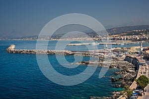 Harbor and lighthouse of the city of rethymno in in crete greece