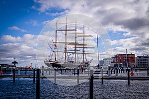 the harbor of Luebeck-Travemuende with the sailing ship Passat