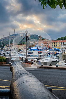 Harbor and old cannon at Port-Vendres at morning in France