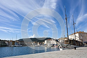 Harbor with sailing ship