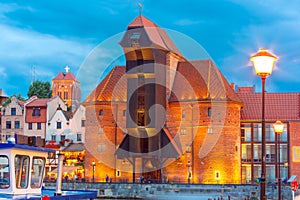 Harbour crane and city gate Zuraw, Gdansk, Poland photo