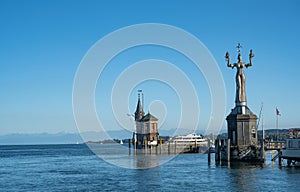 Harbour entrance of Konstanz with lighthouse and the statue of Imperia, Lake Constance (Bodensee).