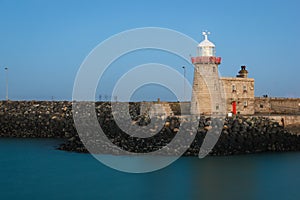 Harbour lighthouse at night. Howth. Dublin. Ireland