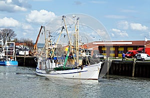 Harbour with shrimp boat in Buesum, Germany