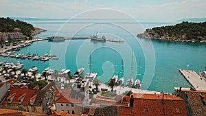 Harbour view of Makarska Riviera city. The serene waterfront opens to the Adriatic sea, under Biokovo mountain in