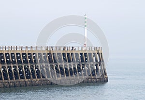 Harbour wall at Newhaven. East Sussex. UK photo