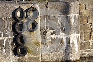 Harbour wall and tyres