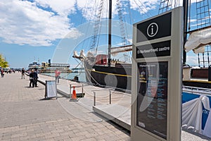 The Harbourfront Centre sign with an old sailship in the background