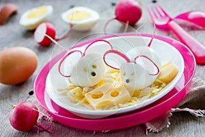 Hard boiled egg mice snack with cheese