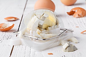 Hard boiled egg sliced on egg cutter