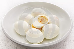 Hard Boiled Eggs in a Bowl One Cut