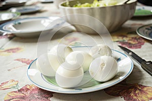 hard-boiled eggs on a laid table