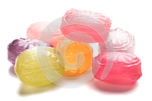 Hard candies over white background