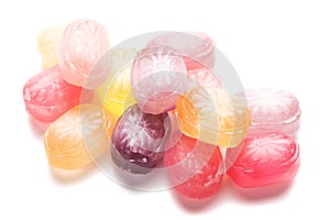 Hard candies over white background