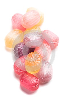 Hard candies over white background