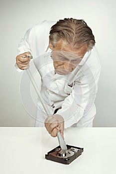 Hard disc drive specialist erasing data from hard disc drive