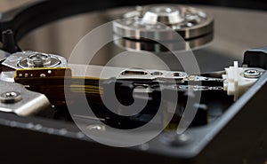 Hard disk drive. Computer disk inside. Focus on the read and write head