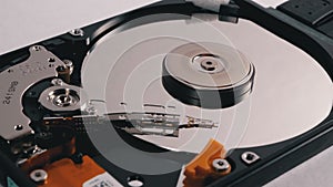 Hard Disk Drive Inside. Structure of HDD, Spinning Platter. Move magnetic head