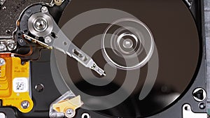 Hard Disk Drive Inside. Structure of HDD, Spinning Platter. Move magnetic head