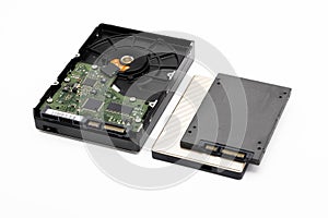 Hard disk and ssd disk (solid state drive) on white background , size comparison of hard disk