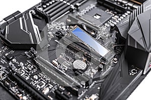 Hard disk SSD m2 on the motherboard background.