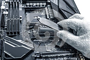 Hard disk SSD m2 on the motherboard background.