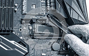 Hard disk SSD m2 on the motherboard background.