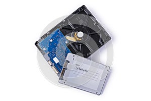 Hard disks and solid state SATA drives on the white background,