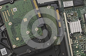 Hard drive circuit boards and electronic components close-up symbolizing data storage technology computer hardware and IT systems