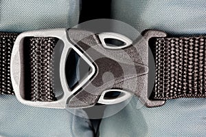 Hard plastic safety buckle with nylon webbing photo
