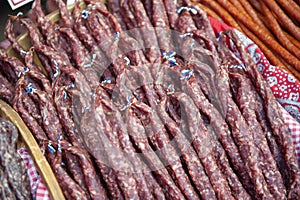 Hard red colored sausages