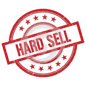 HARD SELL text written on red vintage round stamp