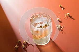 Hard seltzer cocktail with chamomile and ice