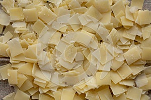 Hard Shaved Parmesan Cheese, top view. Overhead view, flat lay