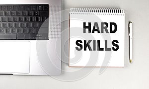 HARD SKILLS text on notebook with laptop and pen