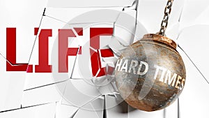 Hard times and life - pictured as a word Hard times and a wreck ball to symbolize that Hard times can have bad effect and can