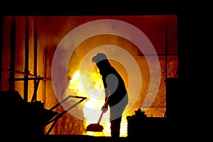 Hard work in a foundry, melting iron