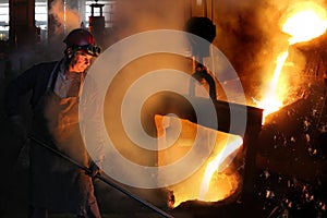 Hard work in the foundry photo