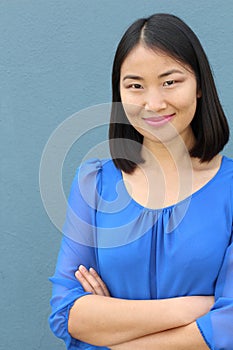 Hard worker looking businesswoman with arms crossed