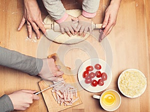 Hard-working hands. Cooking with children. Child and mother hand