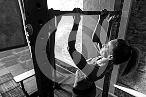 Hard working persistent woman keeping herself fit photo