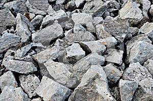 Hardcore waste recycling. Broken concrete slabs at construction site. oncrete rubble from demolition at landfill.  Recycling and