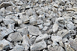 Hardcore waste recycling. Broken concrete slabs at construction site. oncrete rubble from demolition at landfill.  Recycling and